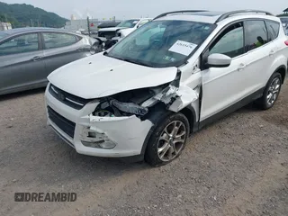 2014 Ford Escape SE with VIN 1FMCU9G99EUA09575, listed as a IAAI auction lot 42615476 with 107,948 mi miles and . Bid and sale history available at DreamBid. Image 6.