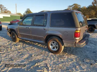 1997 Ford Explorer XL with VIN 1FMDU34XXVUC61582, listed as a Copart auction lot 81957344 with 153,852 mi miles and Salvage title. Bid and sale history available at DreamBid. Image 2.