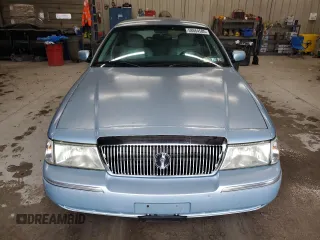 2003 Mercury Grand Marquis LS Premium z VIN 2MEHM75W33X645484, wystawiony jako Copart lot #58664585 z przebiegiem 145 064 mil mil oraz Tytuł czysty. Historia ofert i sprzedaży dostępna na DreamBid. Obrazek 5.