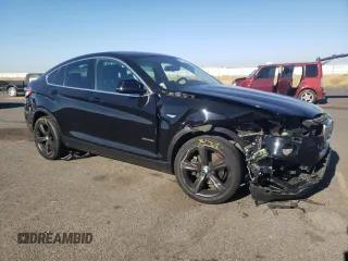 2015 BMW X4 xDrive28i with VIN 5UXXW3C53F0M87790, listed as a Copart auction lot 65936083 with 0 mi miles. Bid and sale history available at carsss.com. Image 4.