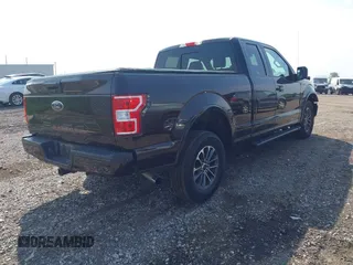 2018 Ford F-150 XL with VIN 1FTFX1E59JKG09710, listed as a IAAI auction lot 42458880 with 89,222 mi miles and . Bid and sale history available at DreamBid. Image 4.
