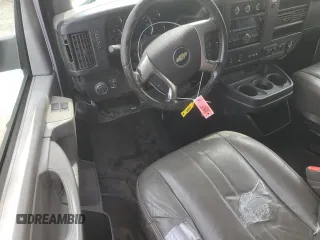 2013 Chevrolet Express Cargo with VIN 1GCZGTCA7D1177735, listed as a Copart auction lot 48693815 with 101,380 mi miles and Salvage title. Bid and sale history available at DreamBid. Image 8.
