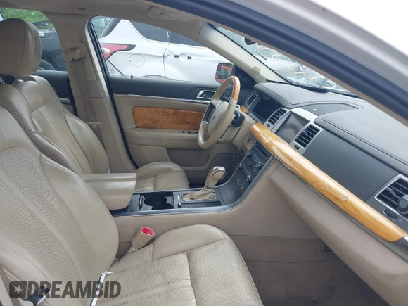 2011 Lincoln MKS EcoBoost with VIN 1LNHL9FT0BG600880, listed as a IAAI auction lot 42283485 with 116,198 mi miles and . Bid and sale history available at DreamBid. Image 5.