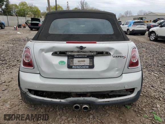 2015 MINI Convertible S with VIN WMWZP3C57F2A91437, listed as a Copart auction lot 53883525 with 28,185 mi miles and Salvage title. Bid and sale history available at DreamBid. Image 6.