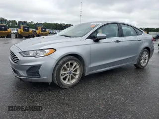 2020 Ford Fusion SE with VIN 3FA6P0HD0LR256243, listed as a Copart auction lot 56513215 with 59,996 mi miles and Salvage title. Bid and sale history available at DreamBid. Image 1.