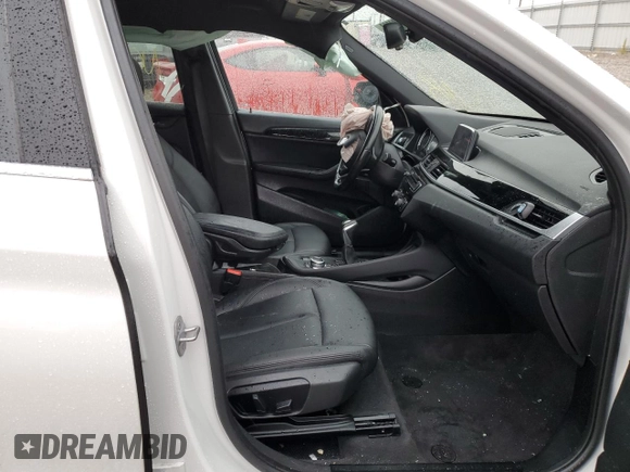 2019 BMW X1 sDrive28i with VIN WBXHU7C53K5L12037, listed as a Copart auction lot 65538082 with Not Provided miles and . Bid and sale history available at DreamBid. Image 5.