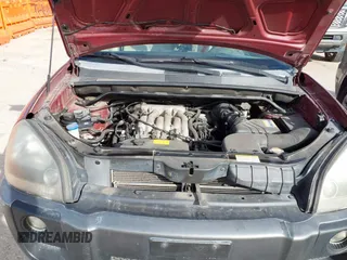 2006 Hyundai Tucson GLS with VIN KM8JN12D16U453097, listed as a IAAI auction lot 41819035 with 237,312 mi miles. Bid and sale history available at carsss.com. Image 10.