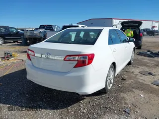 2014 Toyota Camry SE with VIN 4T1BK1FK2EU540026, listed as a IAAI auction lot 41678692 with 85,275 mi miles. Bid and sale history available at carsss.com. Image 4.