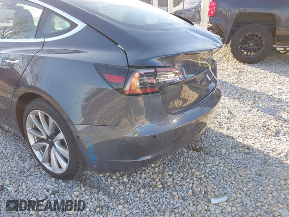 2020 Tesla Model 3 Long Range with VIN 5YJ3E1EB9LF795408, listed as a IAAI auction lot 41735428 with 56,013 mi miles. Bid and sale history available at carsss.com. Image 21.