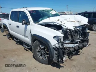 2022 Toyota Tacoma SR z VIN 3TMCZ5AN0NM499428, wystawiony jako IAAI lot #41874787 z przebiegiem Nie podano mil oraz . Historia ofert i sprzedaży dostępna na DreamBid. Obrazek 1.