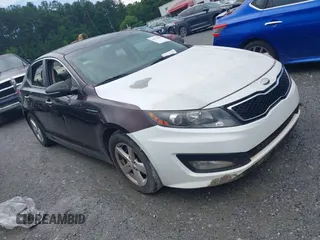 2014 Kia Optima LX with VIN 5XXGM4A70EG260667, listed as a IAAI auction lot 42531882 with 147,829 mi miles and . Bid and sale history available at DreamBid. Image 1.