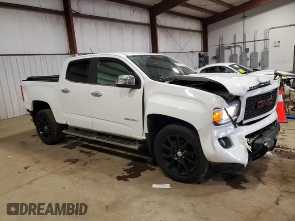 2018 GMC Canyon 4WD Denali z VIN 1GTG6EEN6J1171037, wystawiony jako Copart lot #52521865 z przebiegiem 99 931 mil mil oraz Szkoda całkowita • Salvage title. Historia ofert i sprzedaży dostępna na DreamBid. Obrazek 4.