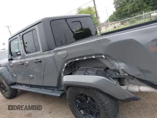 2022 Jeep Gladiator Texas Trail z VIN 1C6HJTAG2NL176011, wystawiony jako IAAI lot #42193864 z przebiegiem 27 219 mil mil oraz . Historia ofert i sprzedaży dostępna na DreamBid. Obrazek 15.