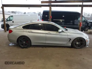 2016 BMW 4 Series 428i xDrive with VIN WBA4C9C56GG139973, listed as a IAAI auction lot 41834506 with 94,587 mi miles and . Bid and sale history available at DreamBid. Image 13.