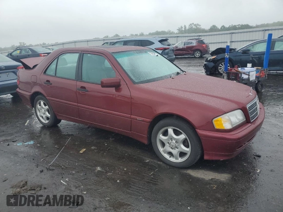 1999 Mercedes-Benz C 230/260/280/320 with VIN WDBHA24G0XA714409, listed as a Copart auction lot 72957094 with 207,439 mi miles and Salvage Title. Bid and sale history available at carsss.com. Image 4.