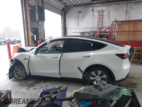2023 Tesla Model Y Long Range z VIN 7SAYGAEEXPF789037, wystawiony jako IAAI lot #41551605 z przebiegiem 8 630 mil mil oraz . Historia ofert i sprzedaży dostępna na DreamBid. Obrazek 14.