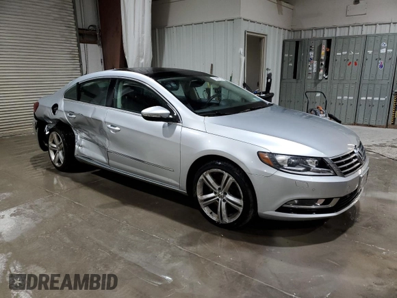 2014 Volkswagen CC VR6 Executive 4Motion with VIN WVWGU7AN5EE525409, listed as a Copart auction lot 83964324 with 118,465 mi miles and Salvage Title. Bid and sale history available at carsss.com. Image 4.
