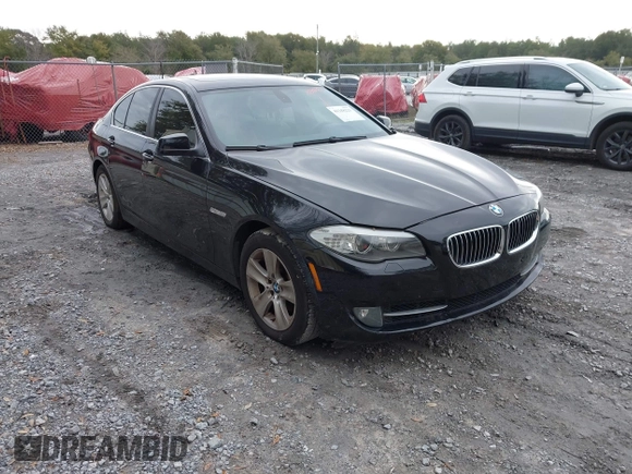 2012 BMW 5 Series 528i with VIN WBAXG5C51CDY28325, listed as a IAAI auction lot 41348221 with 125,039 mi miles. Bid and sale history available at carsss.com. Image 1.