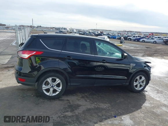 2016 Ford Escape SE with VIN 1FMCU9G90GUB25458, listed as a IAAI auction lot 41643349 with 158,439 mi miles and . Bid and sale history available at DreamBid. Image 14.