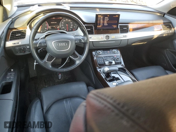 2015 Audi A8 z VIN WAUJGAFD4FN028750, wystawiony jako Copart lot #89099265 z przebiegiem 44 149 mil mil oraz Szkoda całkowita • Salvage title. Historia ofert i sprzedaży dostępna na DreamBid. Obrazek 8.