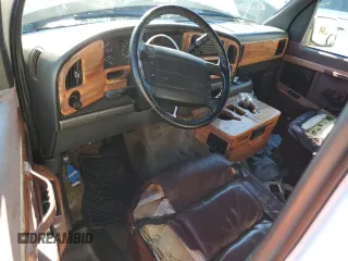 1996 Ford Econoline Cargo z VIN 1FDEE14HXTHA20688, wystawiony jako Copart lot #80077294 z przebiegiem 216 001 mil mil oraz Nie do naprawy • Non repairable. Historia ofert i sprzedaży dostępna na DreamBid. Obrazek 8.