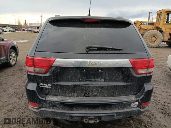 2011 Jeep Grand Cherokee Laredo z VIN 1J4RR4GG5BC508211, wystawiony jako Copart lot #53729935 z przebiegiem 124 408 mil mil oraz Szkoda całkowita • Salvage title. Historia ofert i sprzedaży dostępna na DreamBid. Obrazek 6.
