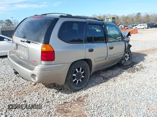 2003 GMC Envoy SLT with VIN 1GKDS13SX32203909, listed as a IAAI auction lot 41457713 with 199,507 mi miles. Bid and sale history available at carsss.com. Image 4.