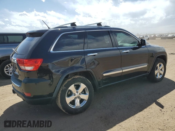 2013 Jeep Grand Cherokee Overland with VIN 1C4RJFCG5DC638927, listed as a Copart auction lot 52752615 with 117,494 mi miles and Salvage Title. Bid and sale history available at carsss.com. Image 3.