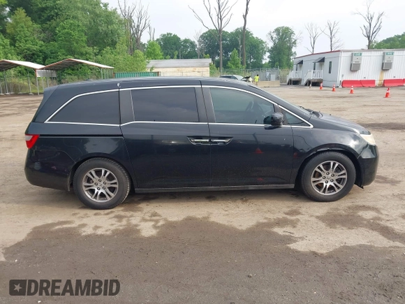 2011 Honda Odyssey EX-L with VIN 5FNRL5H68BB071178, listed as a IAAI auction lot 42286324 with 213,847 mi miles and . Bid and sale history available at DreamBid. Image 13.