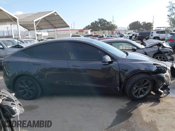 2025 Tesla Model Y Long Range with VIN 7SAYGDED6SF229498, listed as a IAAI auction lot 41086718 with 509 mi miles and . Bid and sale history available at DreamBid. Image 14.