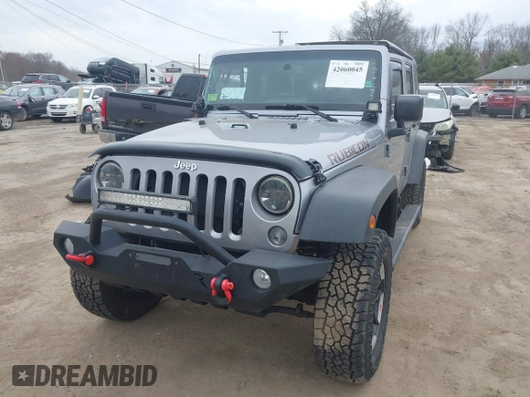 2015 Jeep Wrangler Unlimited Rubicon with VIN 1C4BJWFG1FL546018, listed as a IAAI auction lot 42060045 with 107,249 mi miles and . Bid and sale history available at DreamBid. Image 18.