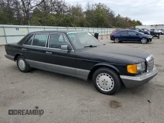 1990 Mercedes-Benz 560 with VIN WDBCA39E7LA509137, listed as a Copart auction lot 70086544 with 167,102 mi miles and Clean Title. Bid and sale history available at DreamBid. Image 4.