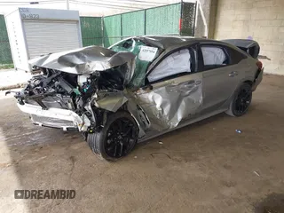 2025 Honda Civic Sport with VIN 2HGFE2F58SH541405, listed as a IAAI auction lot 42057054 with 5,000 mi miles and . Bid and sale history available at DreamBid. Image 2.