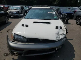 1998 Subaru Impreza Outback Special Sports with VIN JF1GF4853WH808055, listed as a Copart auction lot 75903904 with 101,838 mi miles and Salvage title. Bid and sale history available at DreamBid. Image 5.