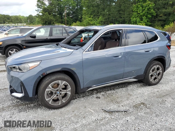2023 BMW X1 xDrive28i with VIN WBX73EF08P5W51452, listed as a Copart auction lot 58420175 with 30,404 mi miles and Salvage title. Bid and sale history available at DreamBid. Image 1.