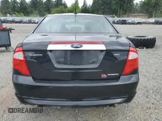2012 Ford Fusion SEL z VIN 3FAHP0JG2CR433596, wystawiony jako Copart lot #59769105 z przebiegiem 126 230 mil mil oraz Czysty tytuł • Clean title. Historia ofert i sprzedaży dostępna na DreamBid. Obrazek 6.