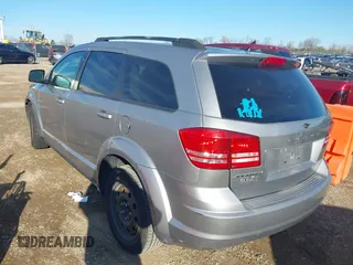 2018 Dodge Journey SE with VIN 3C4PDCAB8JT524456, listed as a IAAI auction lot 40798159 with 111,707 mi miles. Bid and sale history available at carsss.com. Image 3.