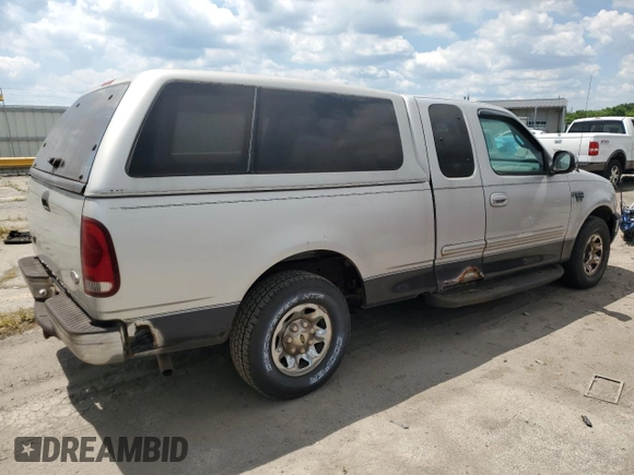 1999 Ford F-250 with VIN 1FTRX27LXXNC18863, listed as a Copart auction lot 63051395 with 118,695 mi miles and Clean title. Bid and sale history available at DreamBid. Image 3.