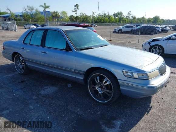 1997 Mercury Grand Marquis LS with VIN 2MELM75W7VX708034, listed as a IAAI auction lot 41878938 with 197,818 mi miles and . Bid and sale history available at DreamBid. Image 1.