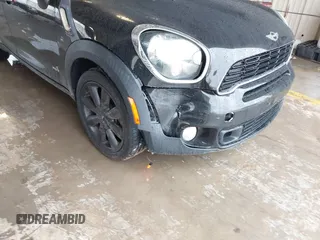 2014 MINI Countryman S z VIN WMWZC5C59EWP36617, wystawiony jako IAAI lot #41550024 z przebiegiem 102 860 mil mil oraz . Historia ofert i sprzedaży dostępna na DreamBid. Obrazek 6.