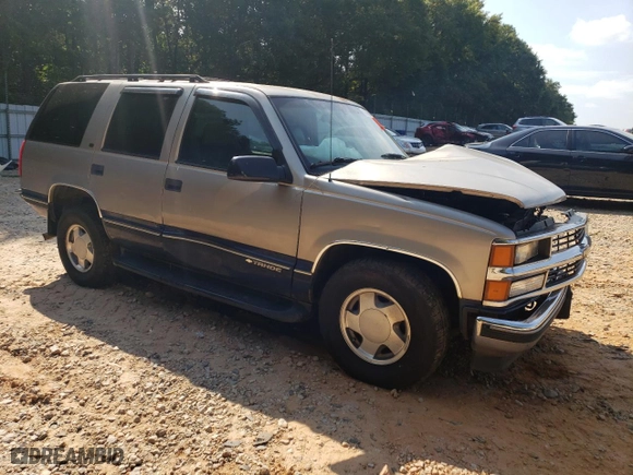 1999 Chevrolet Tahoe Z71 with VIN 1GNEK13R1XJ315188, listed as a Copart auction lot 68498944 with 264,880 mi miles and Salvage Title. Bid and sale history available at carsss.com. Image 4.