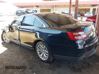 2015 Ford Taurus Limited with VIN 1FAHP2F8XFG135452, listed as a IAAI auction lot 42003510 with 71,476 mi miles. Bid and sale history available at carsss.com. Image 3.