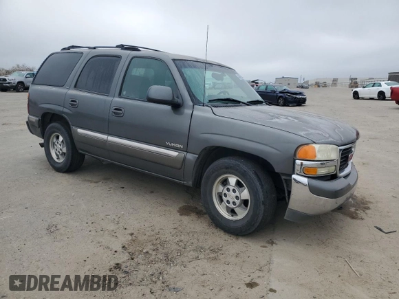 2002 GMC Yukon SLE z VIN 1GKEC13V52J192656, wystawiony jako Copart lot #46674605 z przebiegiem 258 336 mil mil oraz Szkoda całkowita • Salvage title. Historia ofert i sprzedaży dostępna na DreamBid. Obrazek 4.