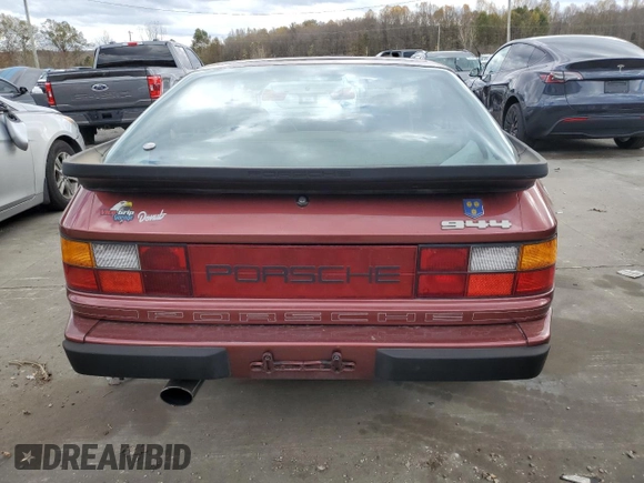 1984 Porsche 944 z VIN WP0AA0948EN461206, wystawiony jako Copart lot #79163494 z przebiegiem 15 862 mil mil oraz Szkoda całkowita • Salvage title. Historia ofert i sprzedaży dostępna na DreamBid. Obrazek 6.