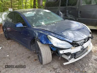 2018 Tesla Model 3 Long Range Battery with VIN 5YJ3E1EA2JF040914, listed as a IAAI auction lot 42120091 with 138,130 mi miles and . Bid and sale history available at DreamBid. Image 1.