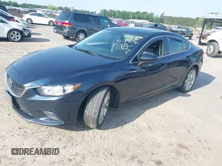 2015 Mazda 6 i Touring with VIN JM1GJ1V57F1183910, listed as a IAAI auction lot 42158716 with 234,765 mi miles. Bid and sale history available at carsss.com. Image 2.