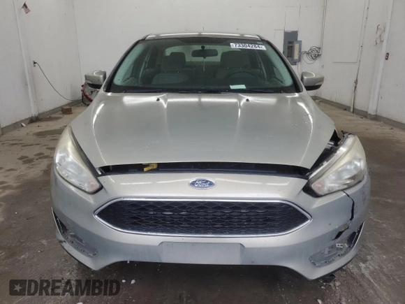2016 Ford Focus SE with VIN 1FADP3F2XGL355148, listed as a Copart auction lot 73304284 with 166,785 mi miles and Salvage Title. Bid and sale history available at carsss.com. Image 5.