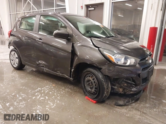 2016 Chevrolet Spark LS with VIN KL8CB6SA1GC570011, listed as a IAAI auction lot 40806037 with 106,786 mi miles. Bid and sale history available at carsss.com. Image 1.