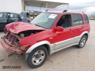 2004 Suzuki Grand Vitara with VIN JS3TE62V344100216, listed as a IAAI auction lot 41734638 with 213,166 mi miles. Bid and sale history available at carsss.com. Image 18.