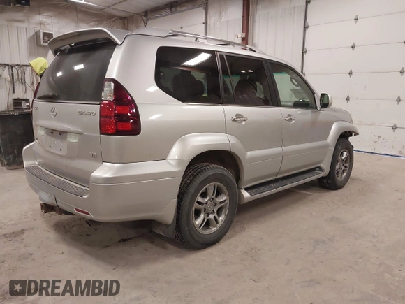2008 Lexus GX 470 with VIN JTJBT20X480157631, listed as a IAAI auction lot 41965864 with 238,660 mi miles. Bid and sale history available at carsss.com. Image 4.